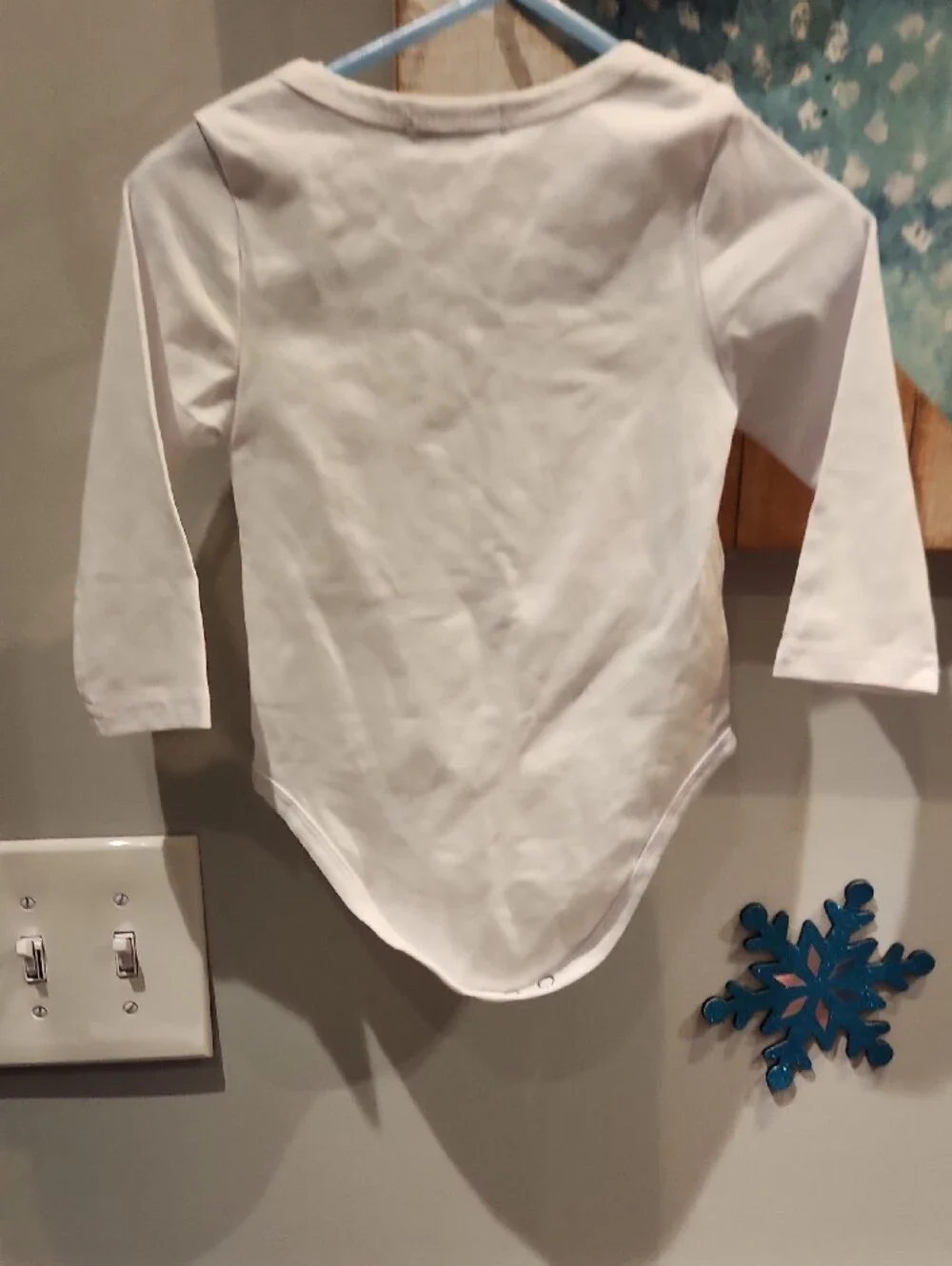 White Long-Sleeve Baby Bodysuit with Gold Floral Script